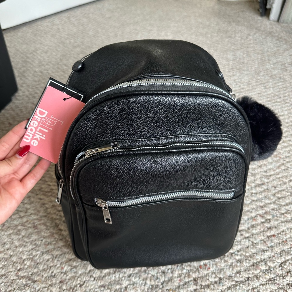 Black Faux Leather Backpack with Pom Pom Bag Charm
